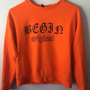 Orange long sleeve crew neck
